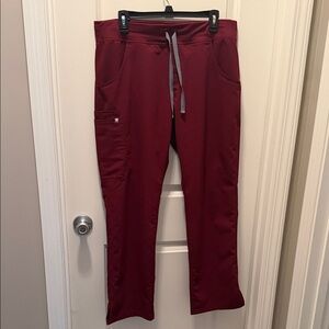 FIGS pant scrub in Burgundy with small white lotus embroidered
